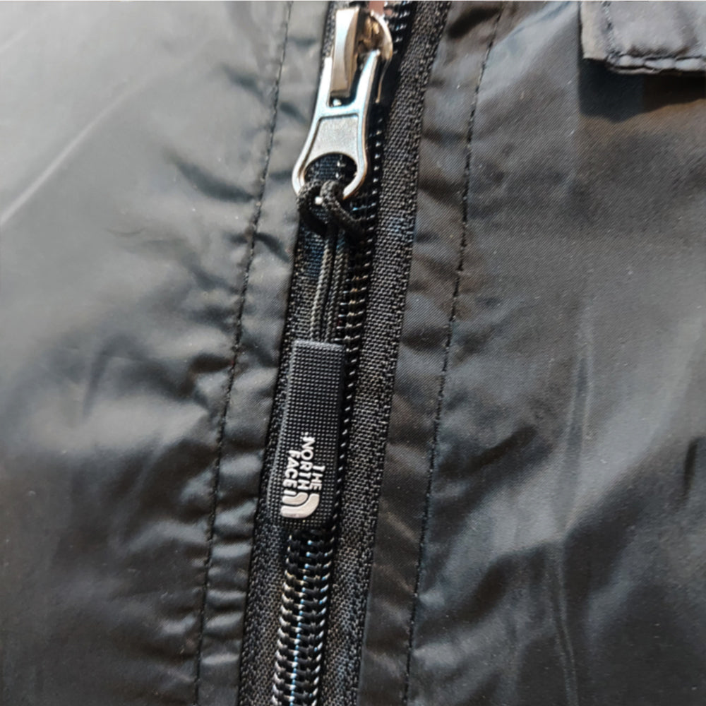 TNF INNRE NET SLLEVLESS WIND BREAKER-BLACK